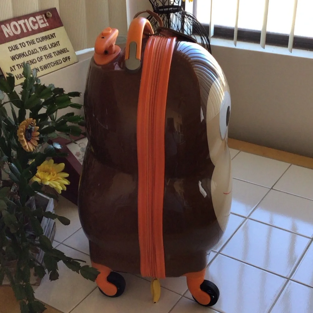 ‘Kirkland Signature’ Hardshell Monkey Face Spinner Luggage - Picture 2 of 9